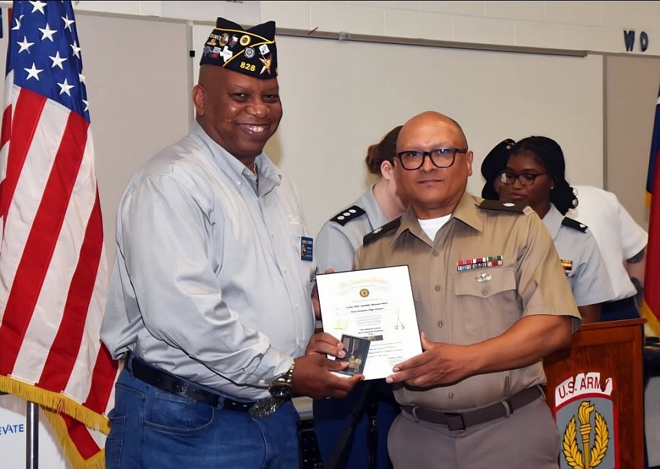 SAN ANTONIO - The American Legion is a strong supporter of Junior Reserve Officer Training Corps (JROTC) and ROTC programs across the country. On May 1, Post Commander Burrell Parmer attended Sam Houston High School’s JROTC Awards Ceremony presenting the Military Excellence Medal to Cadet Kalijah Henderson and the Scholastic Excellence Medal to Cadet Jennifer Monzon-Chun. (Photos by Tesha Parmer)